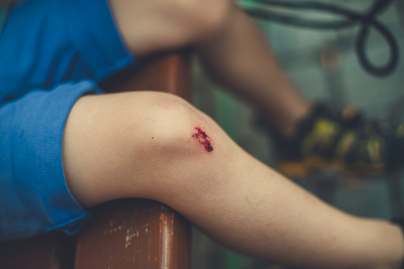 a person with a small tattoo on their arm, general liability